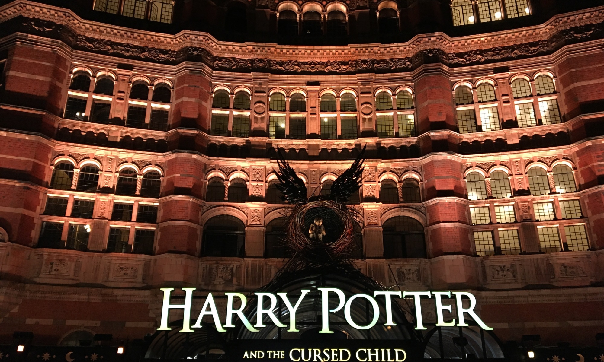 Signage for Harry Potter and the Cursed Child outside Palace Theatre, London.